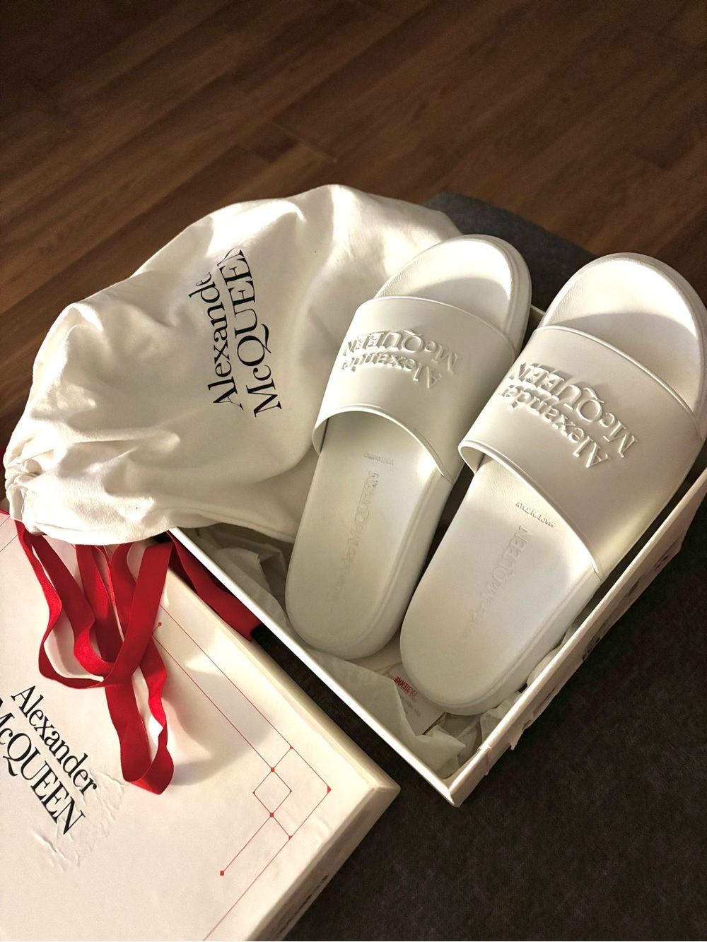 Alexander McQueen White Logo Embossed Slide Sandals.